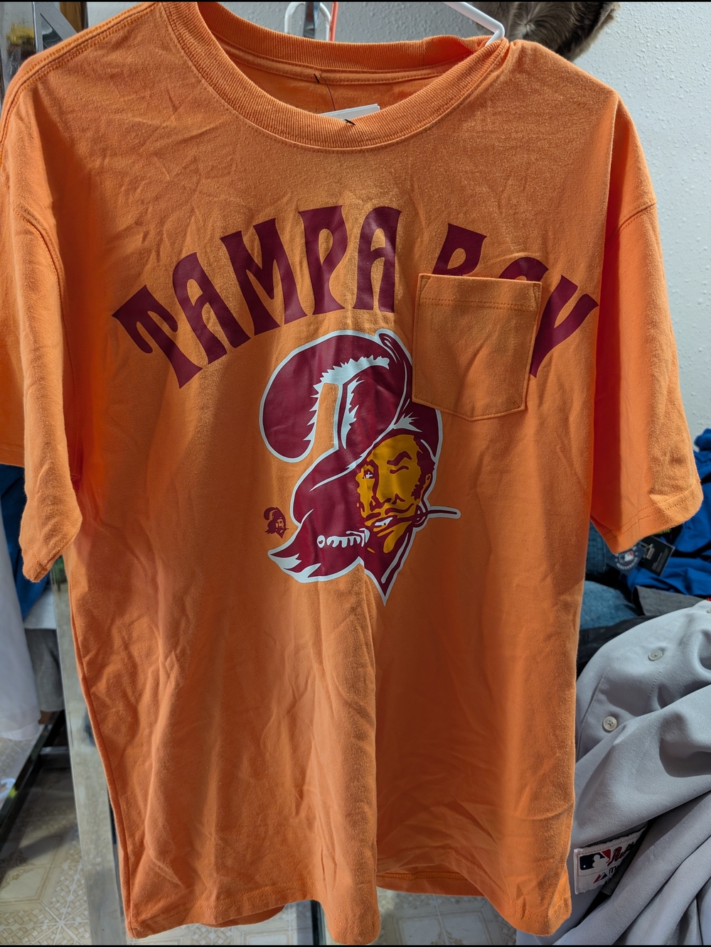 Nike Orange Tampa Bay Short Sleeve Pocket Tee with Maroon Graphic